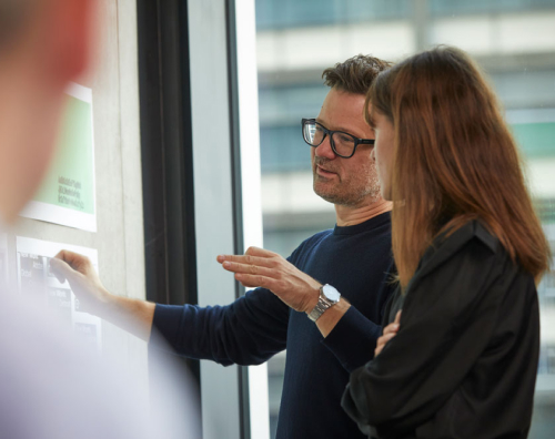 People working in a brand strategy studio
